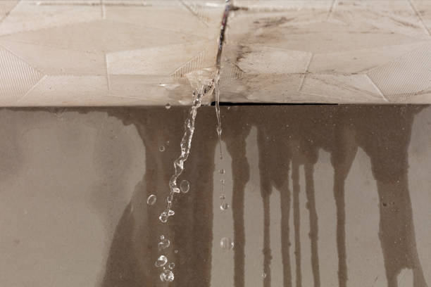 Professional Flood Damage Cleanup technician working in Bedford, IA